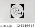 Hand drawn ink illustration of cat silhouette sitting on tree branch against full moon in night scene. Conceptual minimal graphic representing solitude and mystery 124346618