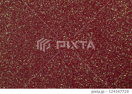 Sparkling red glitter texture with shimmering golden highlights in high resolution Sparkling red glitter texture with shimmering golden highlights in high resolution 124347729