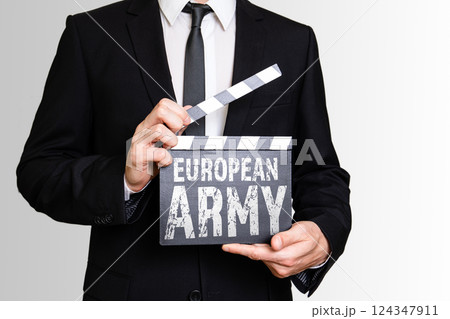 European Army. Businessman showing movie clapper European Army. Businessman showing movie clapper 124347911