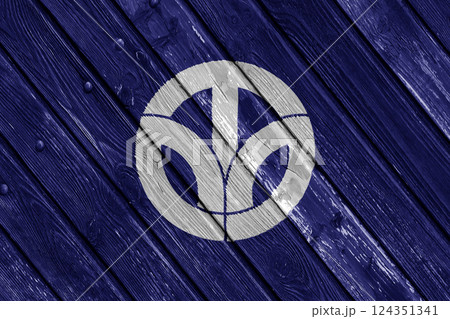 Official flag of Fukui. Prefecture in Japan. Conceptual collage on wood texture Official flag of Fukui. Prefecture in Japan. Conceptual collage on wood texture 124351341