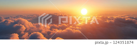 The bright sun is shining beautifully through the fluffy clouds in the vast sky 124351874