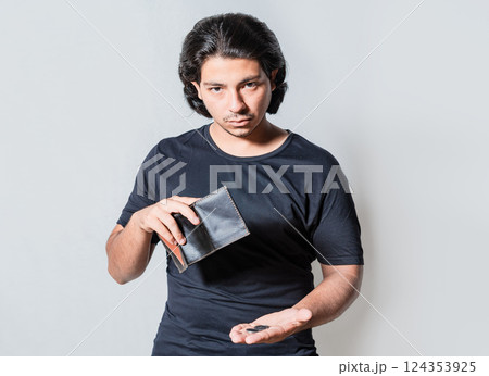Person with financial crisis holding wallet isolated. Sad man holding empty wallet. Unhappy man with financial crisis isolated Person with financial crisis holding wallet isolated. Sad man holding empty wallet. Unhappy man with financial crisis isolated 124353925