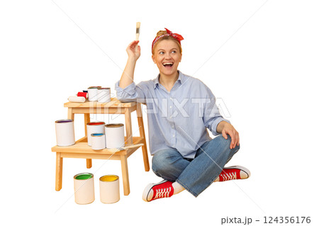 Woman prepares to paint with colorful cans, isolated on white, PNG Woman prepares to paint with colorful cans, isolated on white, PNG 124356176