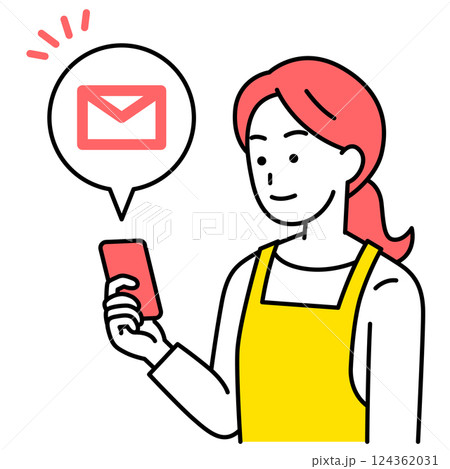 スマートフォンでメールを受信するエプロン姿の女性 124362031