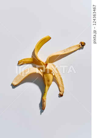Banana peel over white background 124363467
