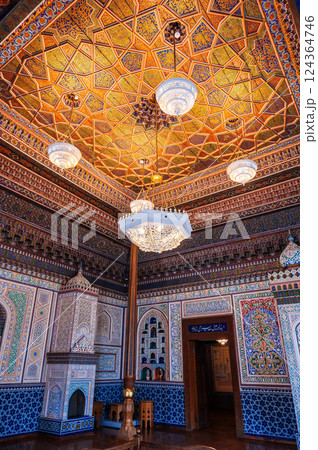 beautiful interior with painted wooden carved ceiling and walls in the Museum of Art of Uzbekistan with traditional Uzbek patterns and oriental ornaments in palace in Tashkent beautiful interior with painted wooden carved ceiling and walls in the Museum of Art of Uzbekistan with traditional Uzbek patterns and oriental ornaments in palace in Tashkent 124364746