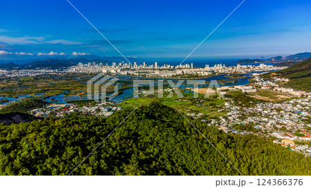 The city is far beyond the hill. The city is far beyond the hill. 124366376