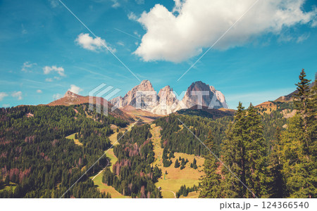 Mountain landscape background. Rocks against the day sky. The Dolomites in South Tyrol, Italy, Europe Mountain landscape background. Rocks against the day sky. The Dolomites in South Tyrol, Italy, Europe 124366540