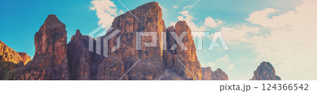 Mountain landscape background. Rocks against the day sky. The Dolomites in South Tyrol Italy Europe. Horizontal banner Mountain landscape background. Rocks against the day sky. The Dolomites in South Tyrol Italy Europe. Horizontal banner 124366542