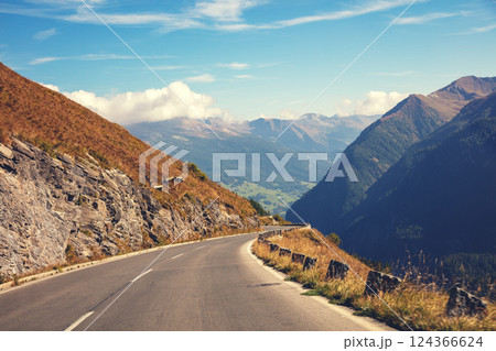 Mountain landscape. Winding mountain road. Grossglockner High Alpine Road. Austria, Europe Mountain landscape. Winding mountain road. Grossglockner High Alpine Road. Austria, Europe 124366624