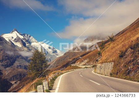 Mountain landscape. Winding mountain road. Grossglockner High Alpine Road. Austria, Europe Mountain landscape. Winding mountain road. Grossglockner High Alpine Road. Austria, Europe 124366733