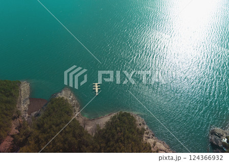 Top view of a mountain lake and rocky shore 124366932