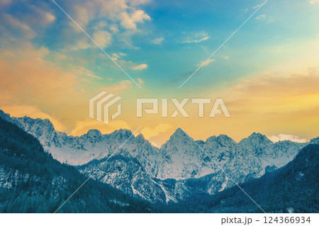 View of the Alps in Gozd Martuljek at sunrise. The tops of the mountains are covered with snow. Triglav national park. Slovenia, Europe 124366934