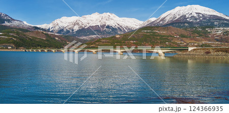 View of Serre-Poncon mountain lake in winter in Hautes Alpes, France 124366935