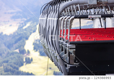 Summer chair lift, many cabins waiting for the season Summer chair lift, many cabins waiting for the season 124366993