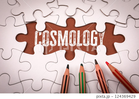 Cosmology. White puzzle pieces and colored pencils Cosmology. White puzzle pieces and colored pencils 124369429