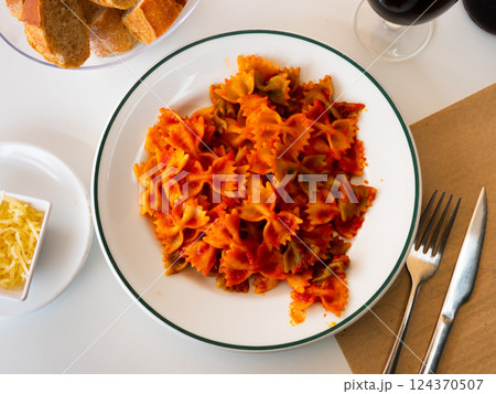 Lazos con tomate, spanish pasta in tomato sauce Lazos con tomate, spanish pasta in tomato sauce 124370507