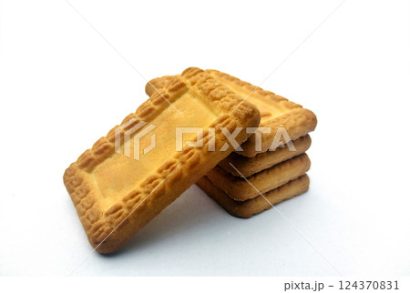 Indian biscuits stacked over white background 124370831