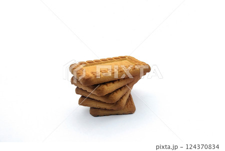 Indian biscuits stacked over white background Indian biscuits stacked over white background 124370834