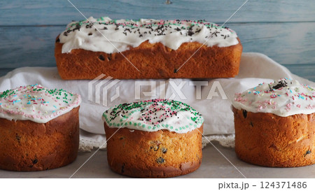 Four cakes on a white towel Four cakes on a white towel 124371486