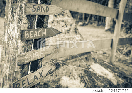 Sand beach surf relax colorful directional arrows Ilha Grande Brazil. 124371752
