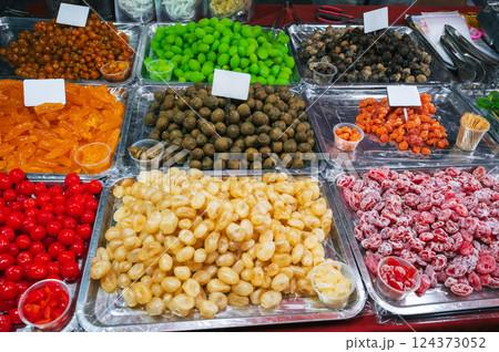 dried fruits and various oriental sweets on Asian market in Asia in Vietnam 124373052