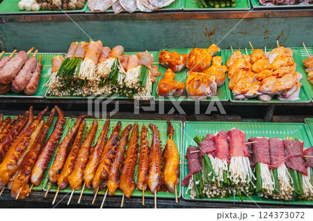 assortment of traditional Vietnamese street food on counter at the Asian Night Market in Vietnam in Asia in Da Nang 124373072
