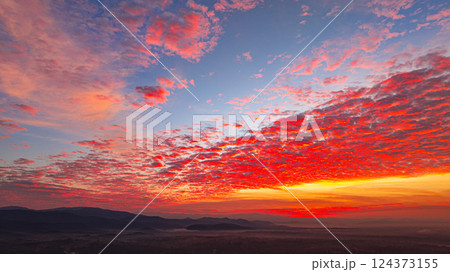 Aerial view of Stunning colorful cloud above unban village Aerial view of Stunning colorful cloud above unban village 124373155