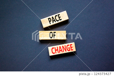 Pace of change symbol. Concept words Pace of change on beautiful wooden blocks. Beautiful black table black background. Business pace of change concept. Copy space. Pace of change symbol. Concept words Pace of change on beautiful wooden blocks. Beautiful black table black background. Business pace of change concept. Copy space. 124373427