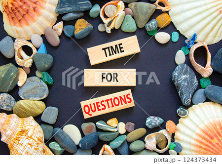 Time for questions symbol. Concept words Time for questions on beautiful wooden blocks. Beautiful black background. Sea shells and sea stones. Business time for questions concept. Copy space. 124373434