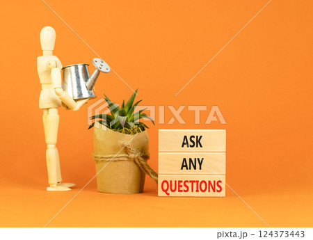 Ask any questions symbol. Concept words Ask any questions on beautiful wooden blocks. Beautiful orange background. Businessman model. Business ask any questions concept. Copy space. Ask any questions symbol. Concept words Ask any questions on beautiful wooden blocks. Beautiful orange background. Businessman model. Business ask any questions concept. Copy space. 124373443