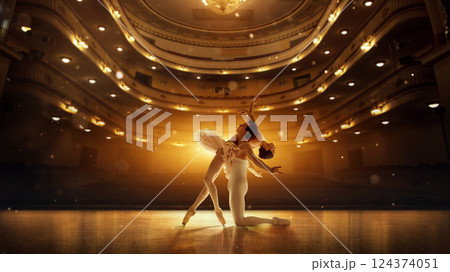 Emotional intensity between ballet partners in deep expressive pose, bodies curved with precision. Emotional intensity between ballet partners in deep expressive pose, bodies curved with precision. 124374051