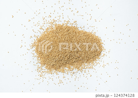 Pile of raw organic amaranth grains on a white background, top view Pile of raw organic amaranth grains on a white background, top view 124374128