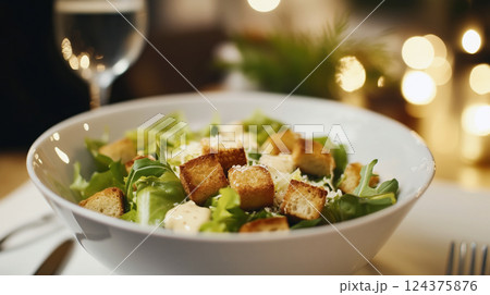 Classic Caesar Salad with Croutons and Parmesan 124375876