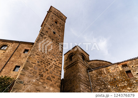 Captured from below, the old stone buildings of Trujillo, Extremadura, rise towards the sky. Captured from below, the old stone buildings of Trujillo, Extremadura, rise towards the sky. 124376879