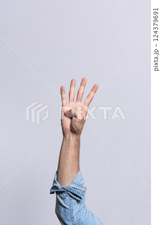 Hand counting number four, Man hand showing number four, Guy finger counting number four on isolated background 124379691