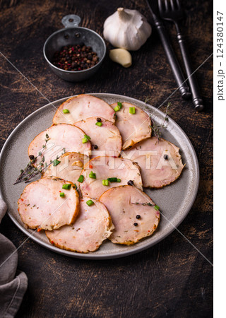 Sliced chicken sausage with herbs Sliced chicken sausage with herbs 124380147