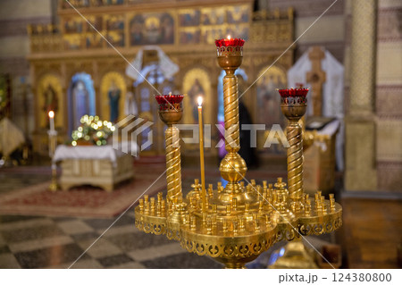 Candlestick in the Orthodox Church closeup. Candlestick in the Orthodox Church closeup. 124380800