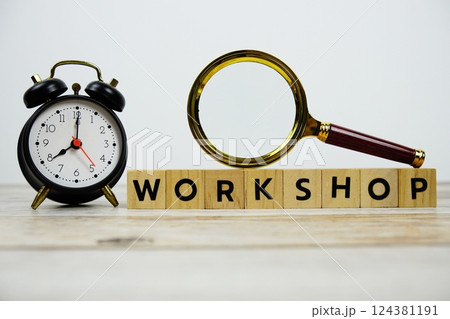 Time to Workshop with wooden blocks alphabet letters and Magnifying glass on wooden background 124381191