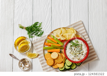 creamy yogurt pickles caper dill dip in red bowl creamy yogurt pickles caper dill dip in red bowl 124381322