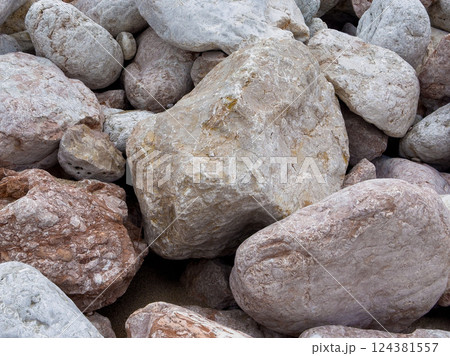 Pile of Large Weathered pink Rocks and Boulders  124381557