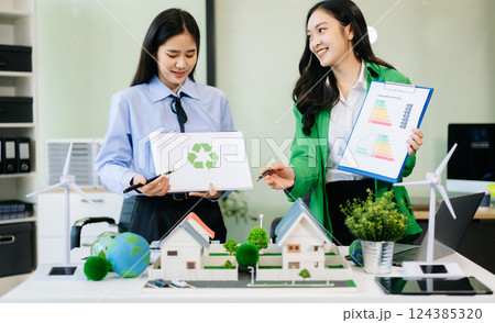Business team people planning hand using laptop for working technology and business Net zero Business team people planning hand using laptop for working technology and business Net zero 124385320