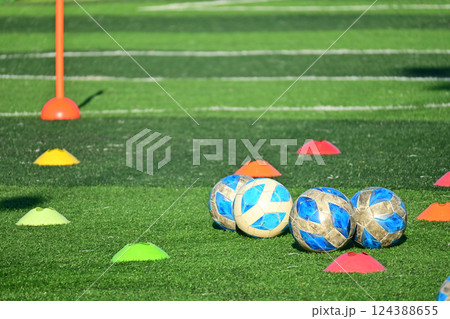 artificial green grass soccer field with training cone and ball artificial green grass soccer field with training cone and ball 124388655