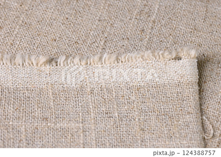 brown hemp viscose natural fabric cloth, sackcloth rough texture of textile fashion 124388757