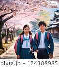 春の桜が咲く新学期に登校する小学生 124388985