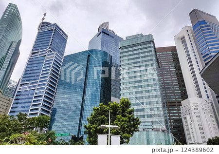 View of modern business skyscrapers glass and sky view landscape of commercial building in central city View of modern business skyscrapers glass and sky view landscape of commercial building in central city 124389602