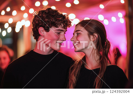 Nervous teens under soft fairy lights, sparks flying at a school dance, a night of First Love 124392004