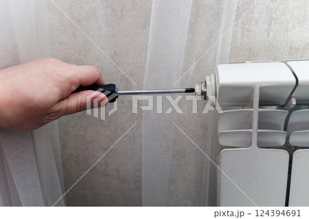 adjusting pressure from the radiator adjusting pressure from the radiator 124394691