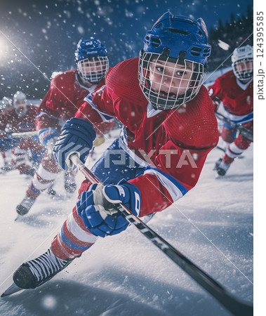Dynamic play unfolds on the ice as juniors skate with determination and skill 124395585