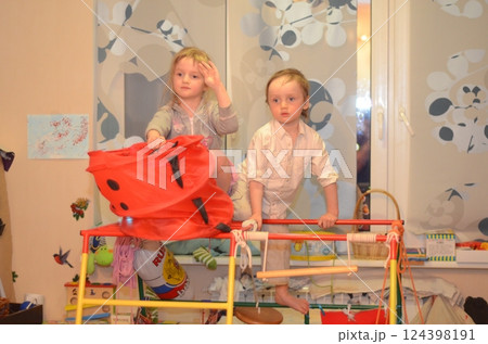 Children climb on a home sports complex Children climb on a home sports complex 124398191